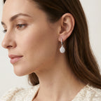 Pear Moissanite Drop Earrings — on-model styling view 2