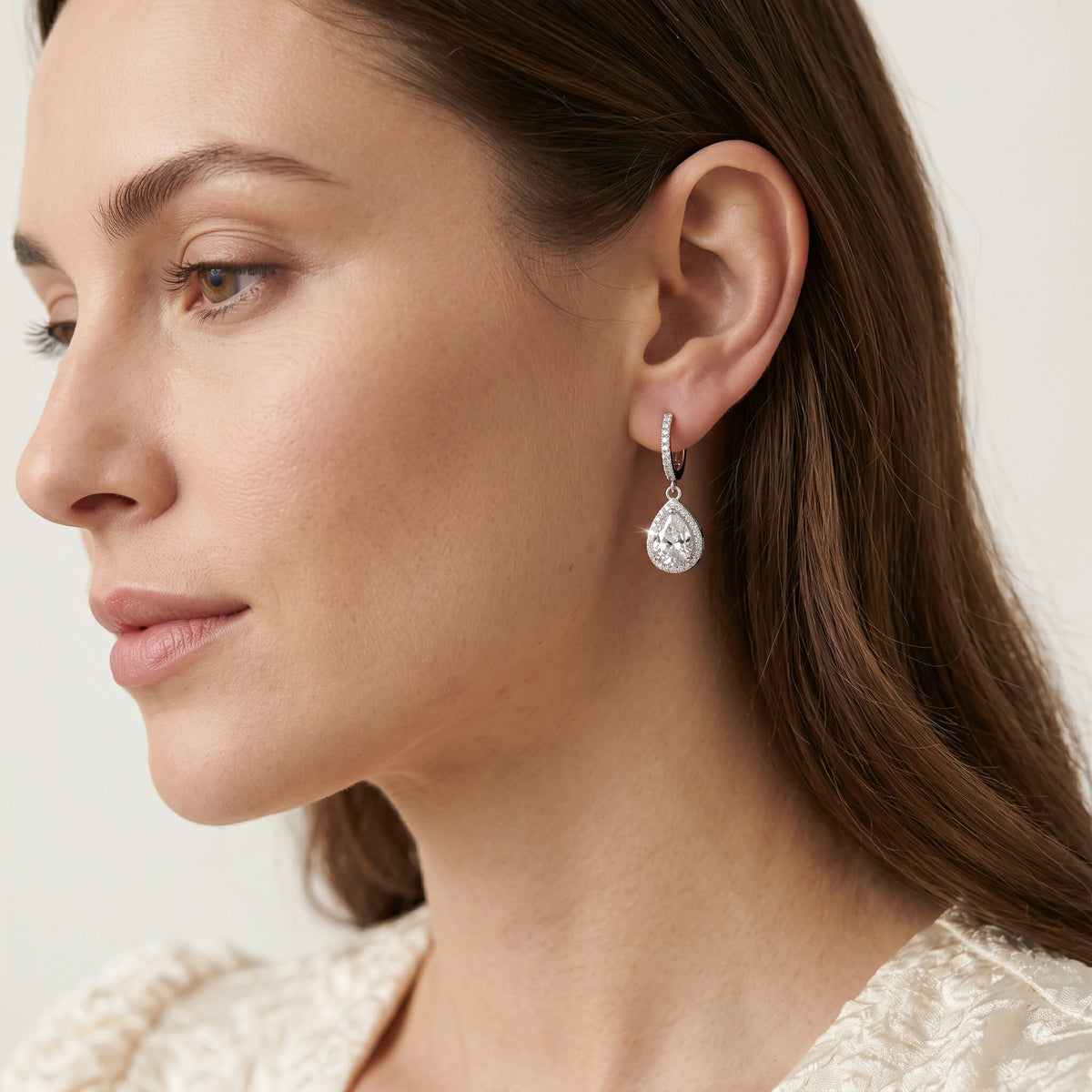 Pear Moissanite Drop Earrings — on-model styling view 2